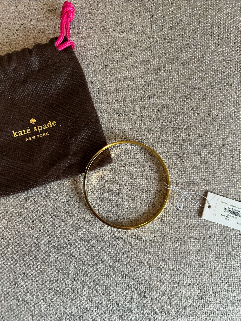 kate spade gold-tone slim bangle bracelet